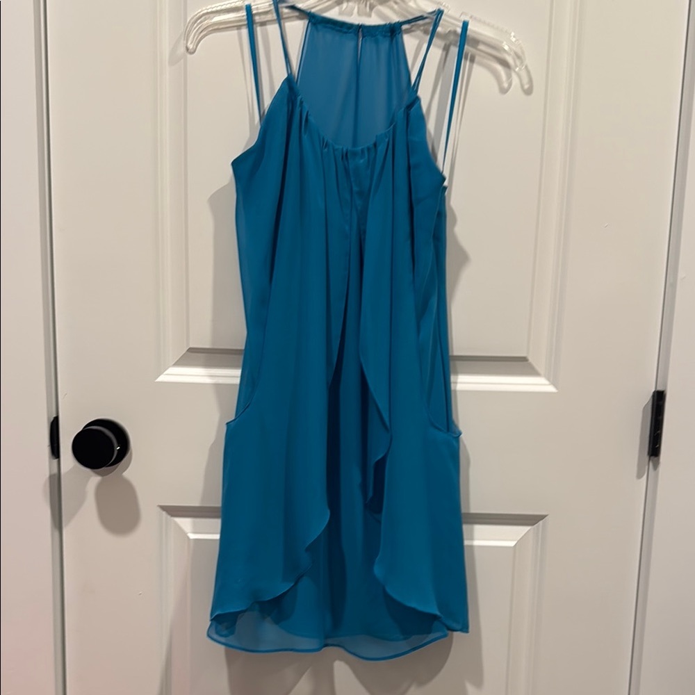 Blue knee-length tiered ruffled sundress with halter neckline for cocktail